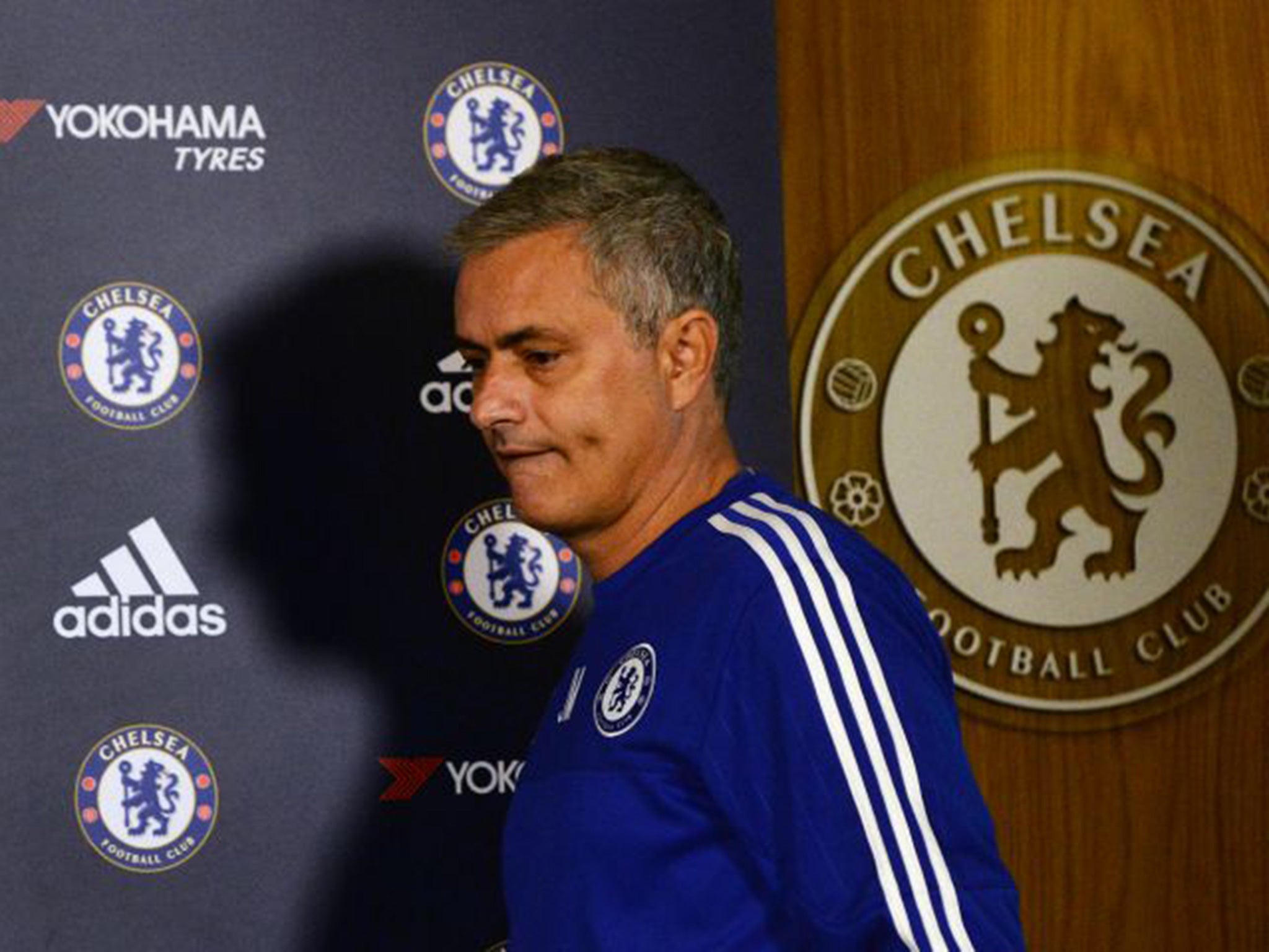 Jose Mourinho leaves a press conference at Cobham on 20 November