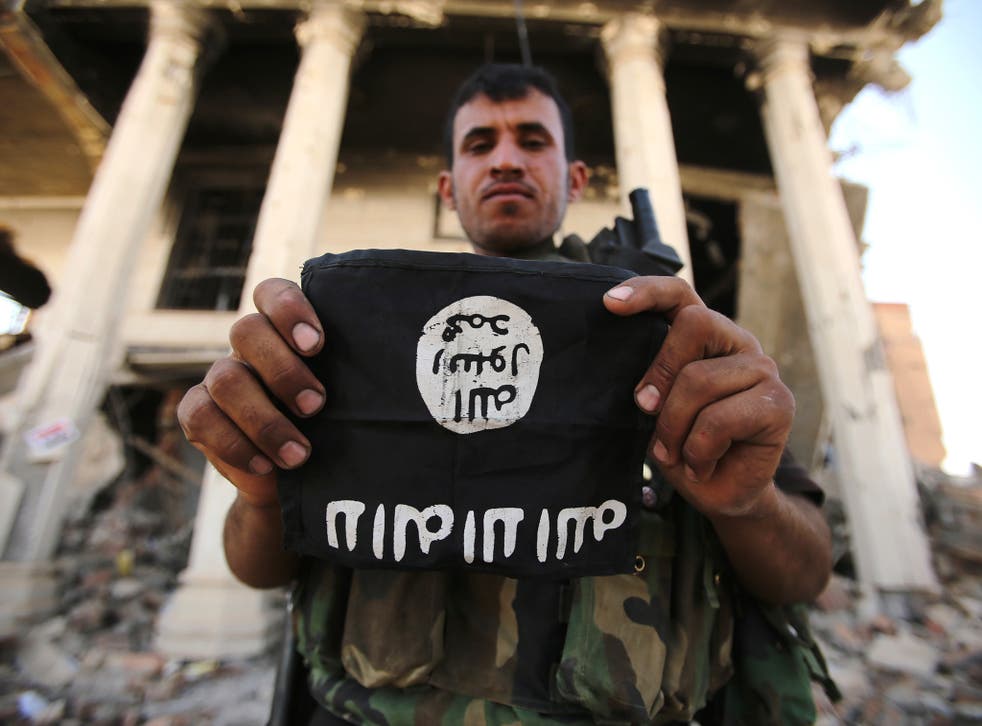 Propaganda assignments arrive on slips of paper bearing the black flag of Isis