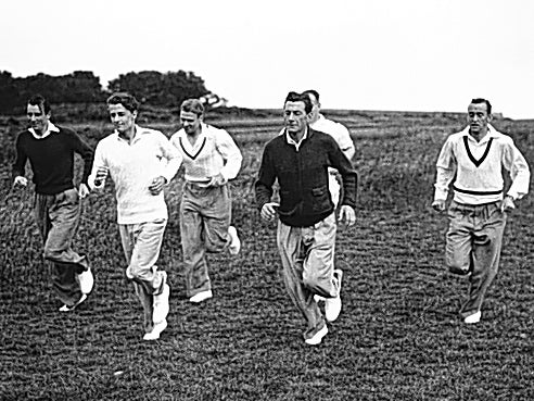 The GB team of Perry, Bunny Austin, Raymond Tuckey, Dan Maskell and Pat Hughes go for a run on Beachy Head