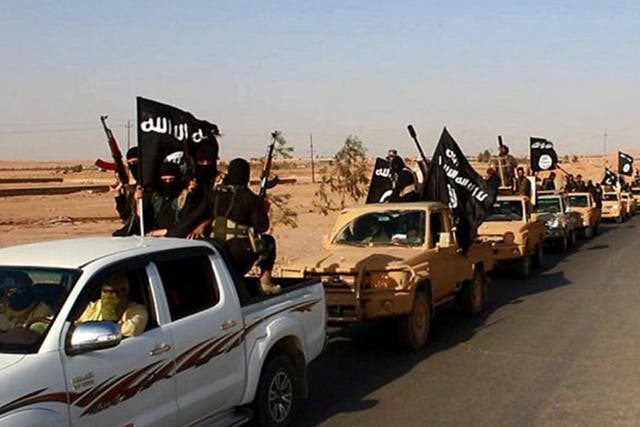 IS parades through Ramadi after killing at least 500 people