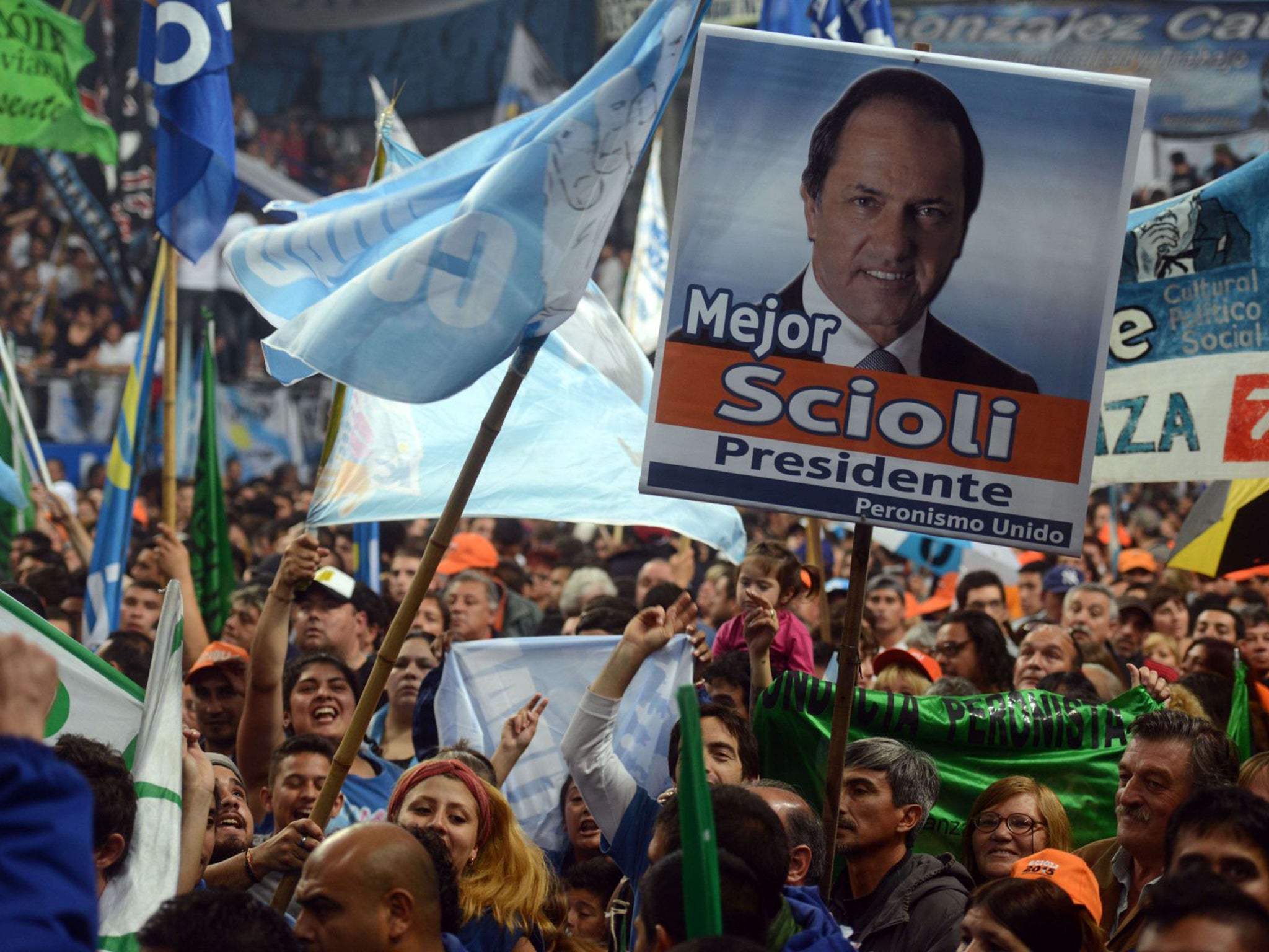 Polls suggest that Daniel Scioli of the Front for Victory party wll lose to the opposition leader, Mauricio Macri