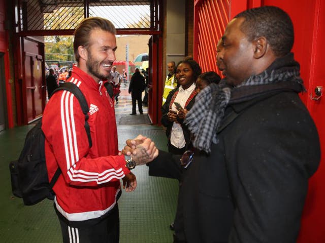 Andy Cole, with David Beckham at last weekend’s Unicef match, was abused over his illness