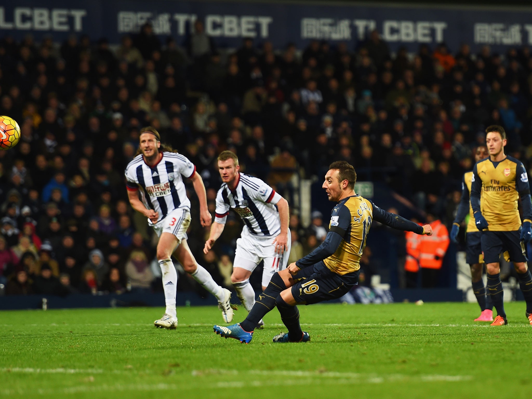 Santi Cazorla slips up while taking the penalty against West Brom