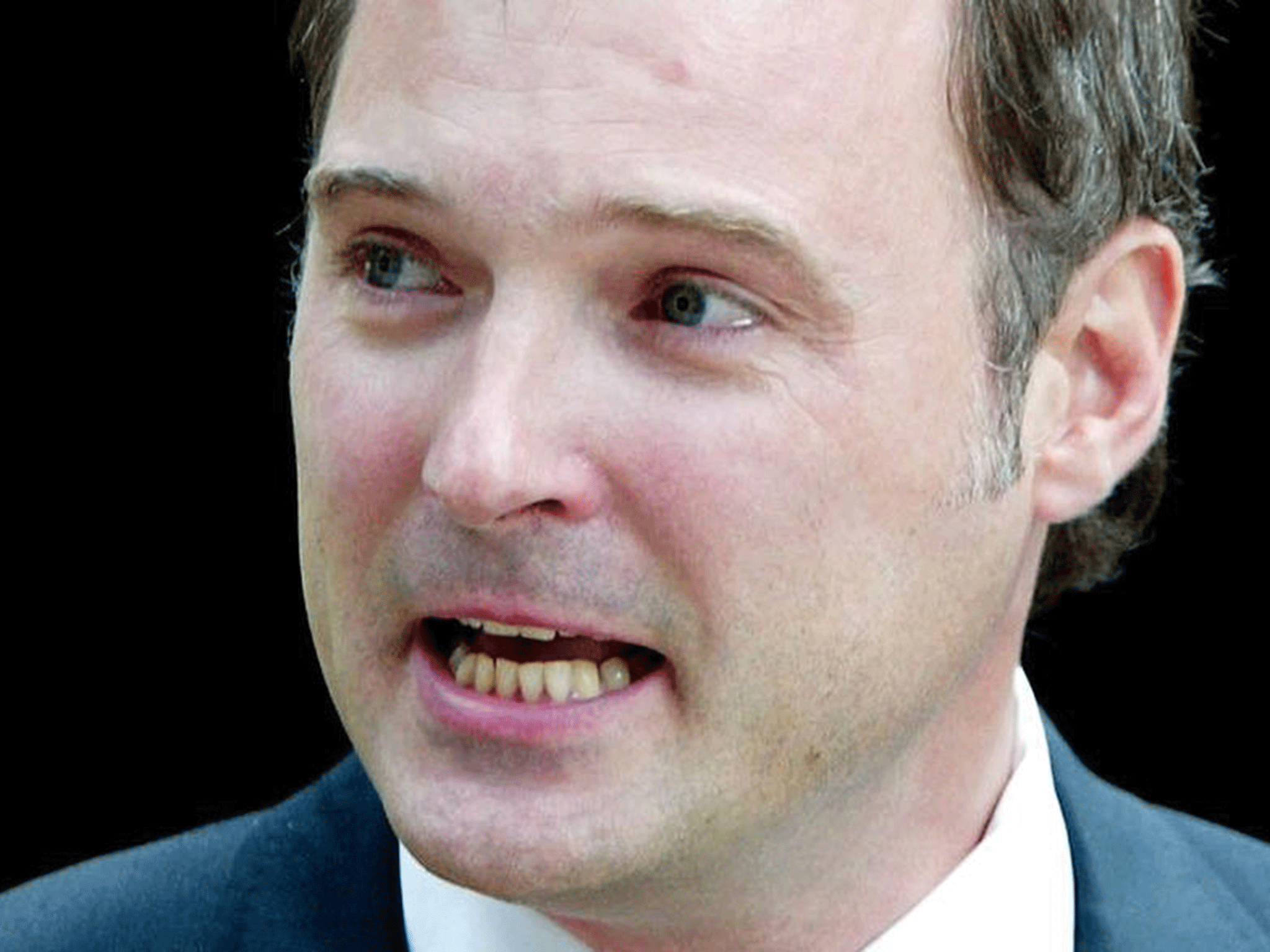 British television presenter John Leslie shows his emotion as he gives
a statement to the waiting media after leaving Southwark Crown Court in
London, July 31, 2003. Prosecutors dropped indecent assault charges
against Leslie.