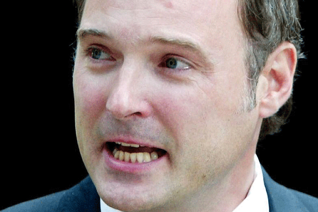 British television presenter John Leslie shows his emotion as he gives
a statement to the waiting media after leaving Southwark Crown Court in
London, July 31, 2003. Prosecutors dropped indecent assault charges
against Leslie.