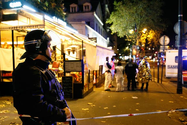 Attackers used guns and bombs at several sites across Paris on Friday