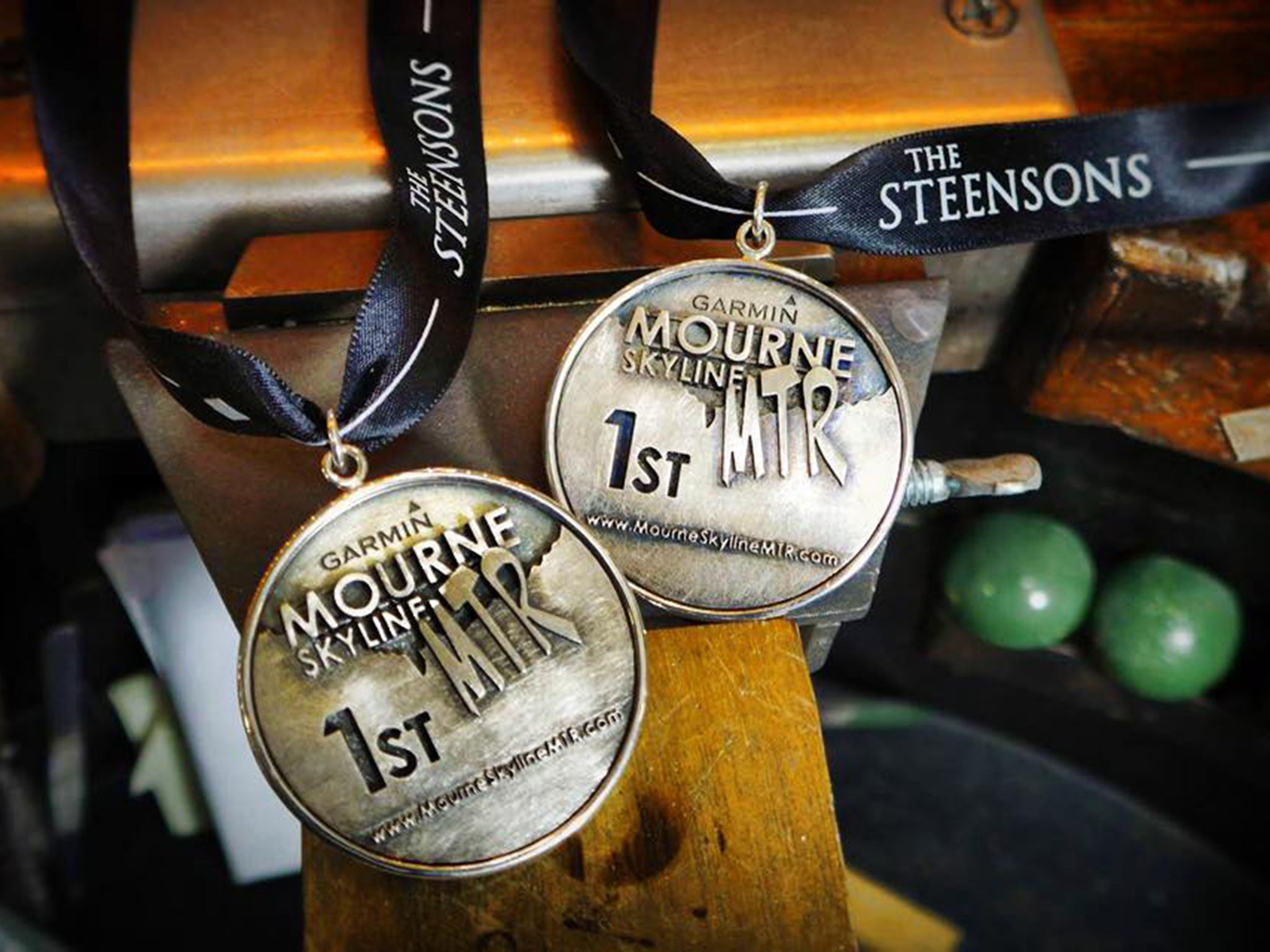 The Garmin Mourne Skyline winner's medals