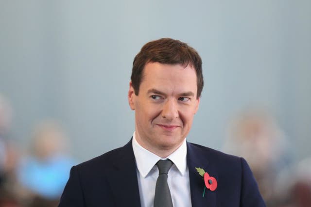 British Chancellor of the Exchequer George Osborne attends the "Day of German Industry" annual gathering