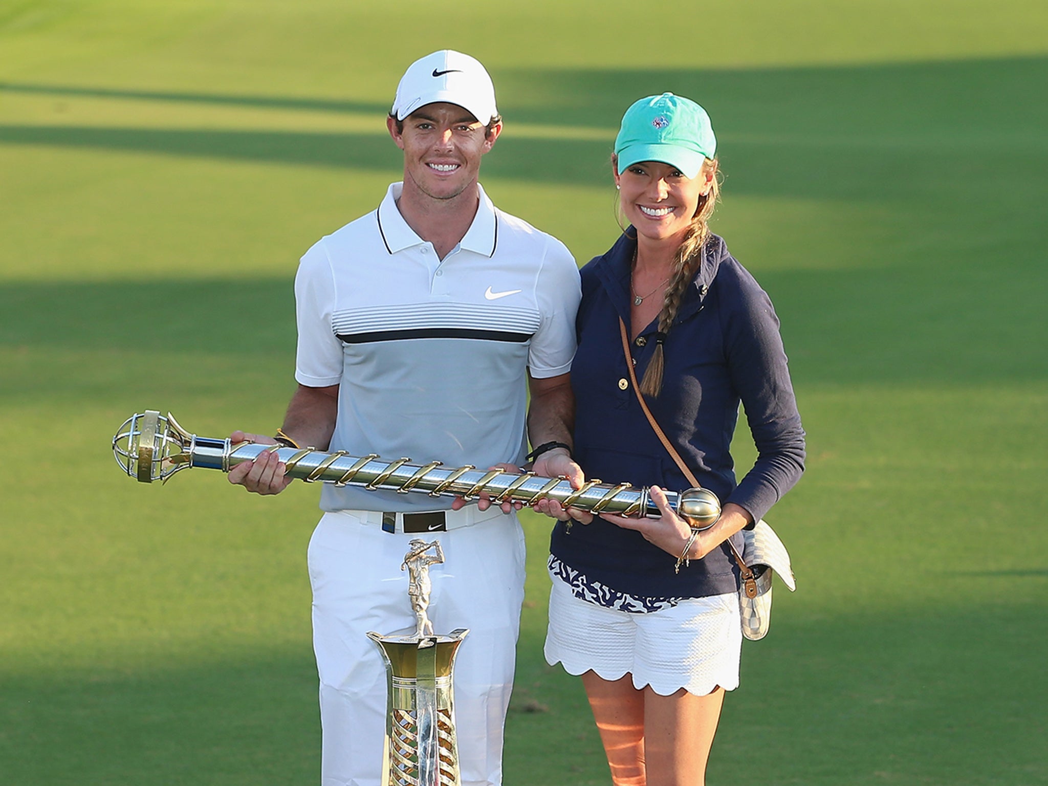 Rory McIlroy celebrates with girlfriend Erica Stoll