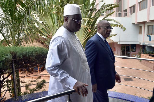Mali’s President Ibrahim Boubacar Keita, right, with Senegal’s president Macky Sall at the hotel