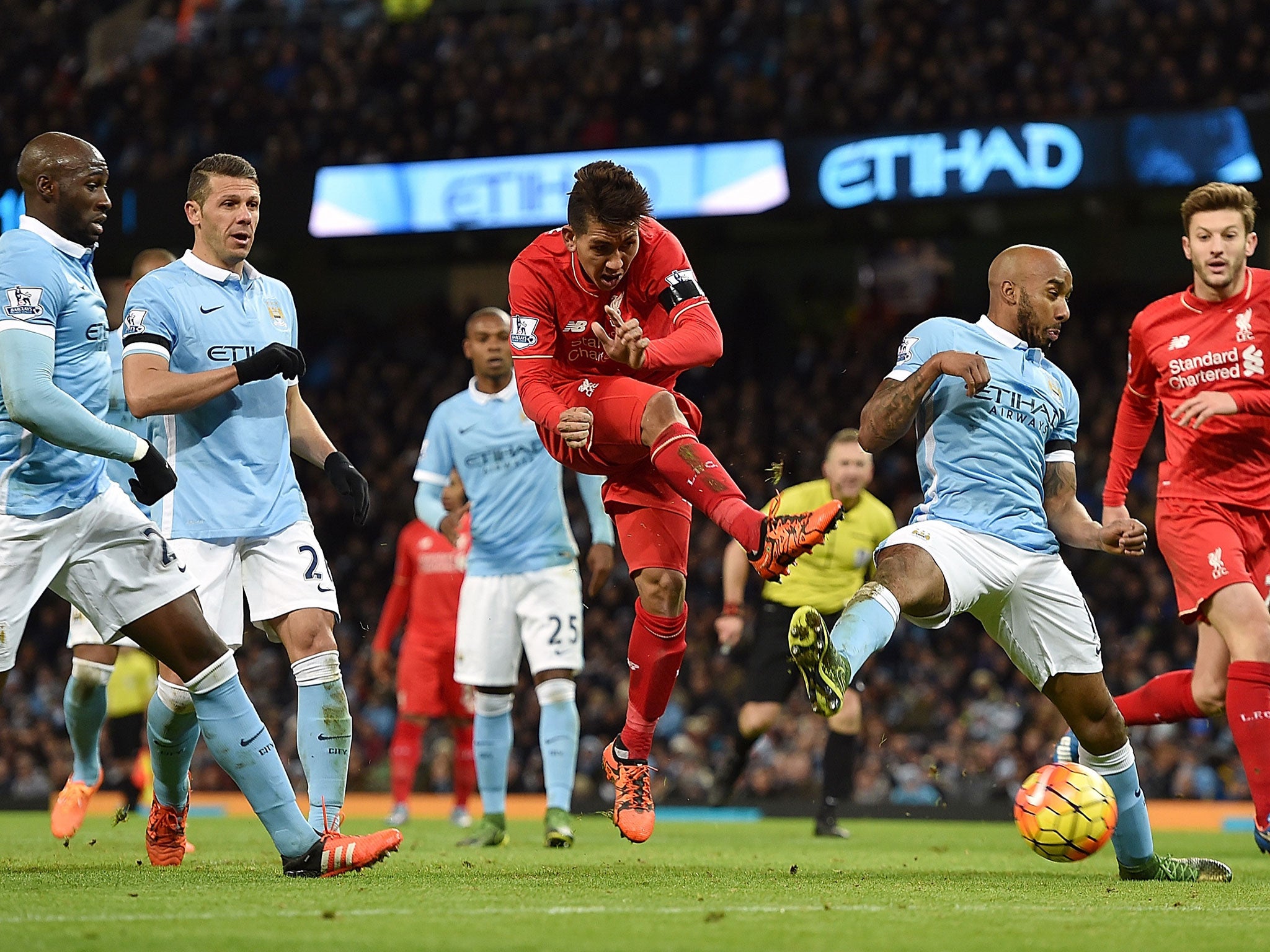Liverpool’s Roberto Firmino shoots during the 4-1 win over Manchester City