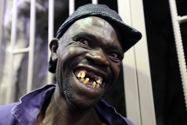 Mison Sere smiles after winning the 2015 edition of the Mr Ugly competition