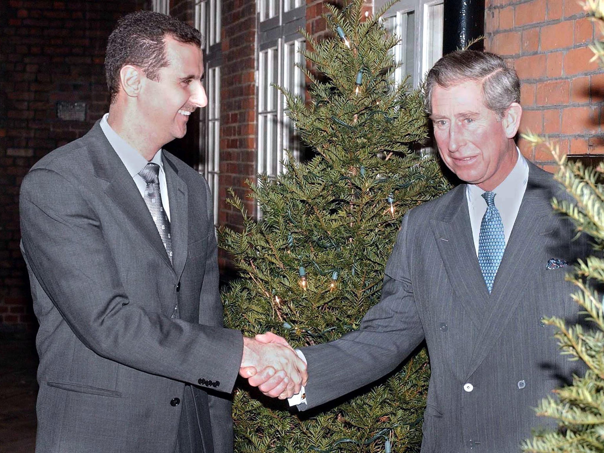 Prince Char;es greets Syrian President Bashar Al-Assad at St.James Palace in 2002