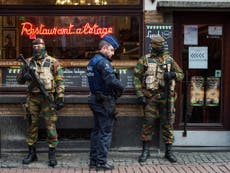 Five more suspects arrested as Brussels remains on lockdown