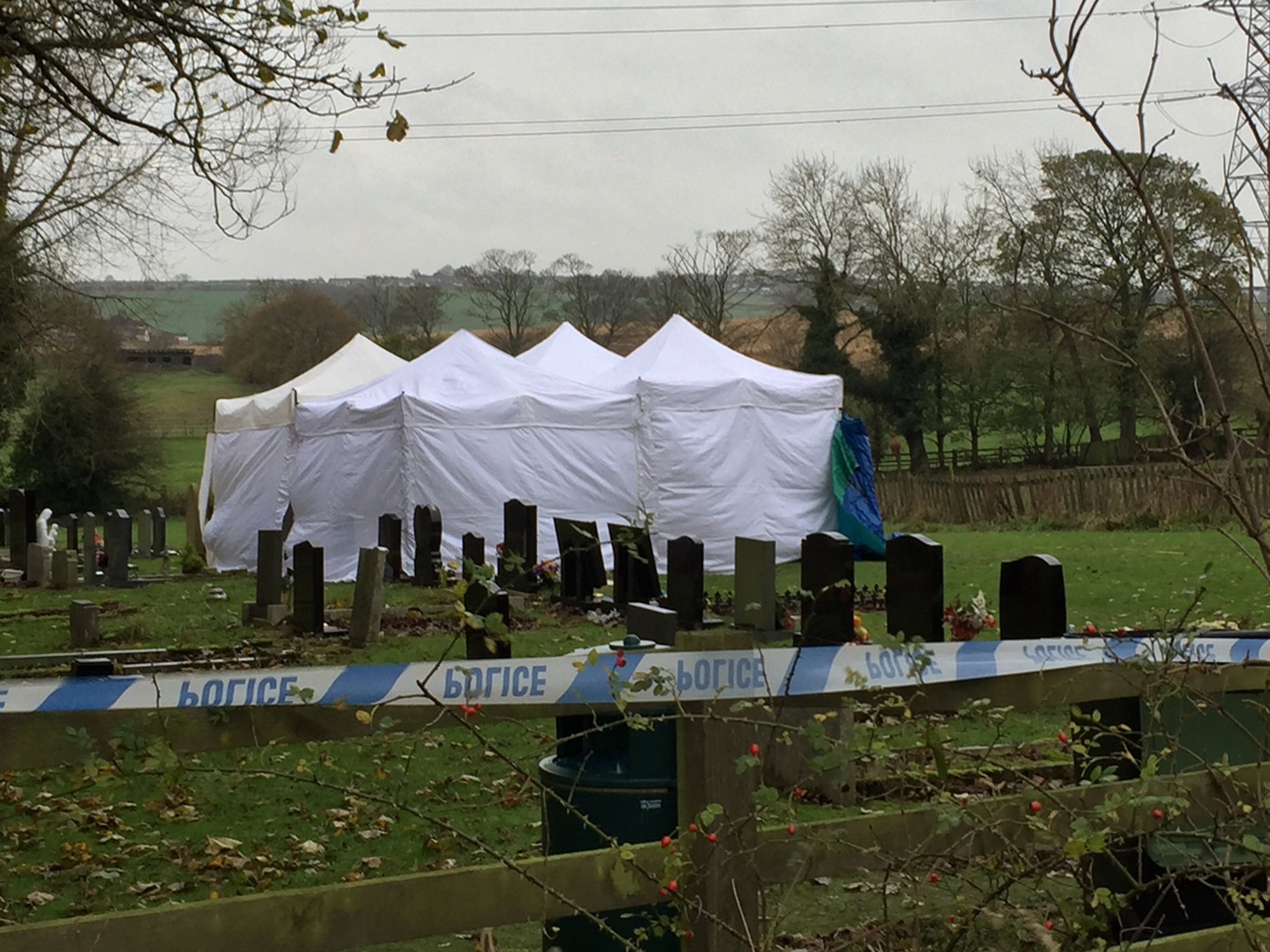 Police were called to a cemetery in Metal Bridge, County Durham, after reports a grave had been disturbed