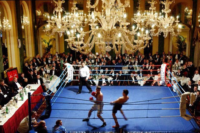 Wilde times: A boxer hits the ropes at a Café Royal event in 2002