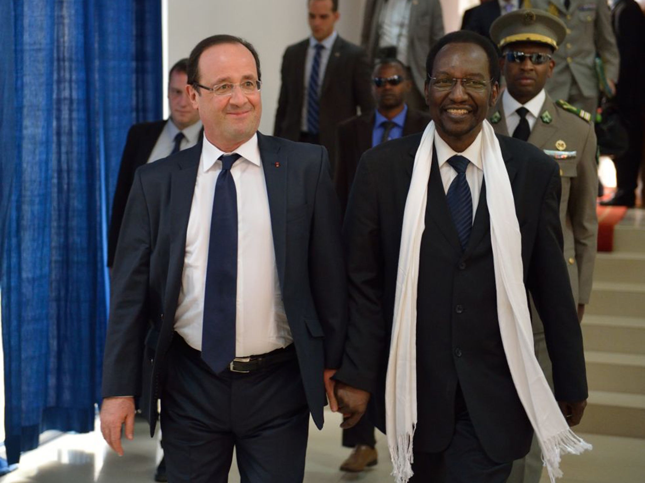 French President Francois Hollande, left, arrives with Mali's interim president Dioncounda Traore at the Bamako presidential palace (AFP/Getty)