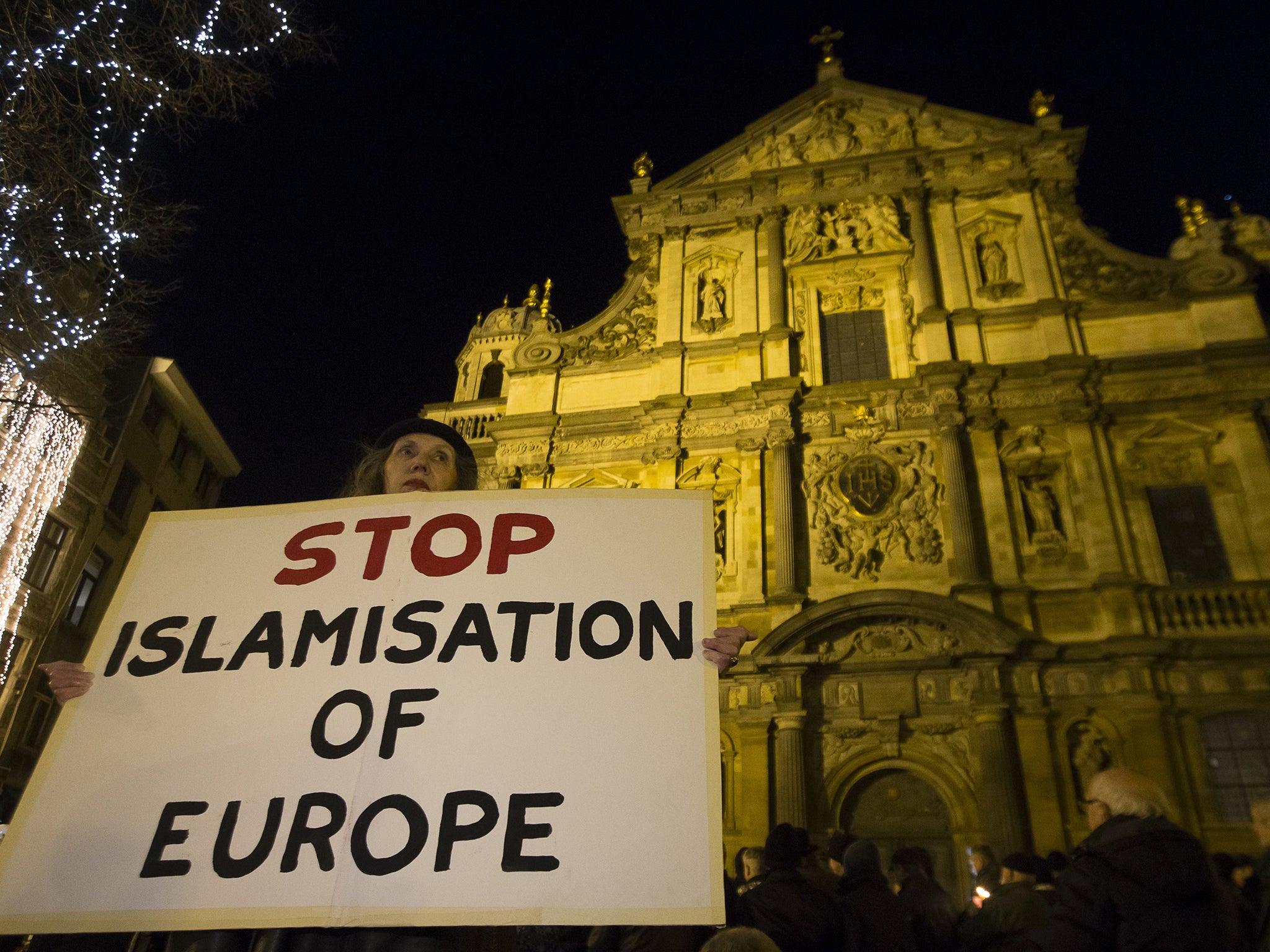 A protester in Antwerp belonging to the German group 'Pegida' (Patriotic Europeans Against the Islamisation of the West) in March. The group drew up to 25,000 people in German street rallies earlier this year