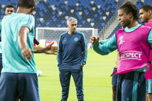 Jose Mourinho watches training at the Sammy Ofer Stadium in the Israeli coastal city of Haifa