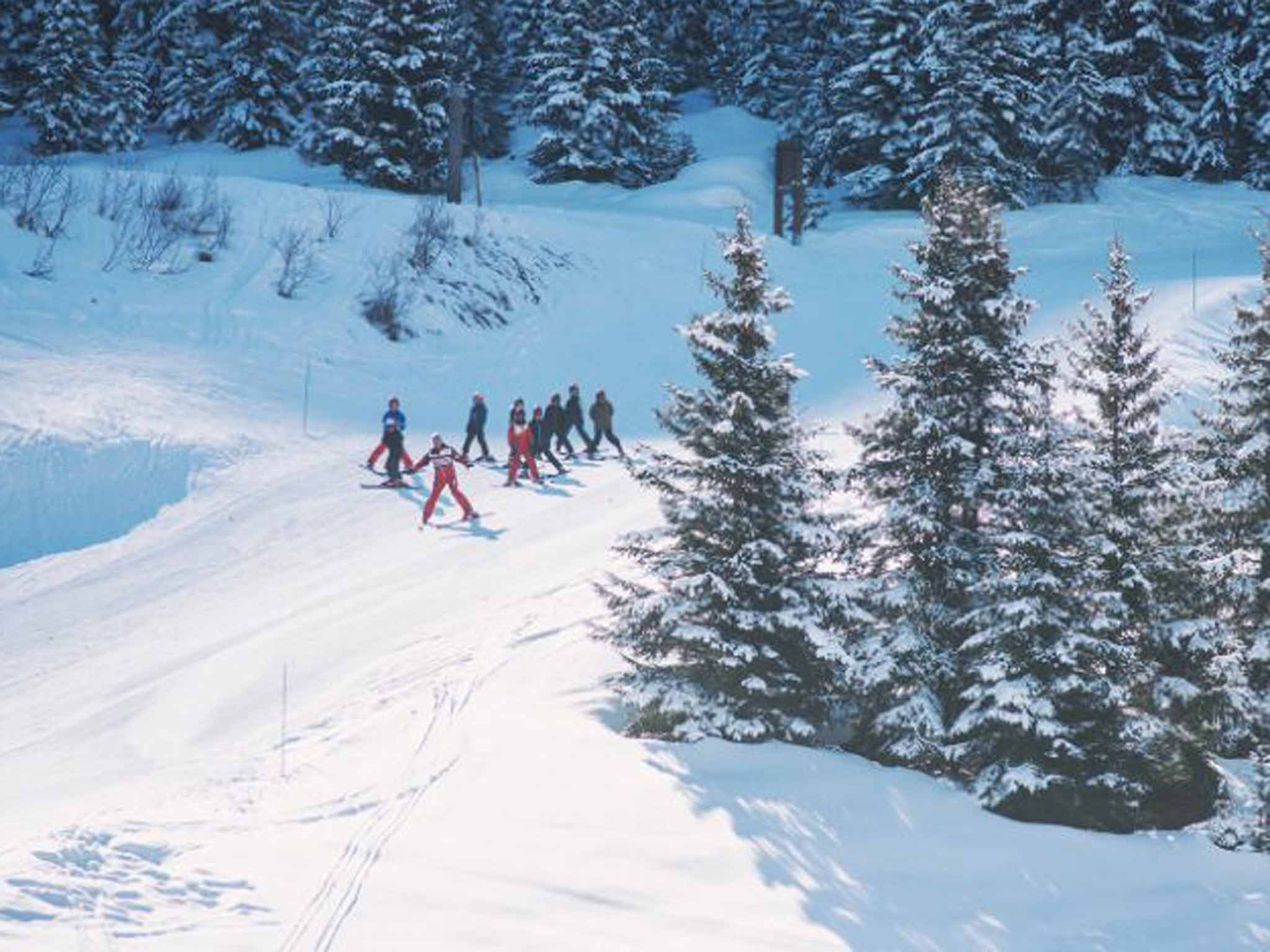 Skiers on the piste in Méribel