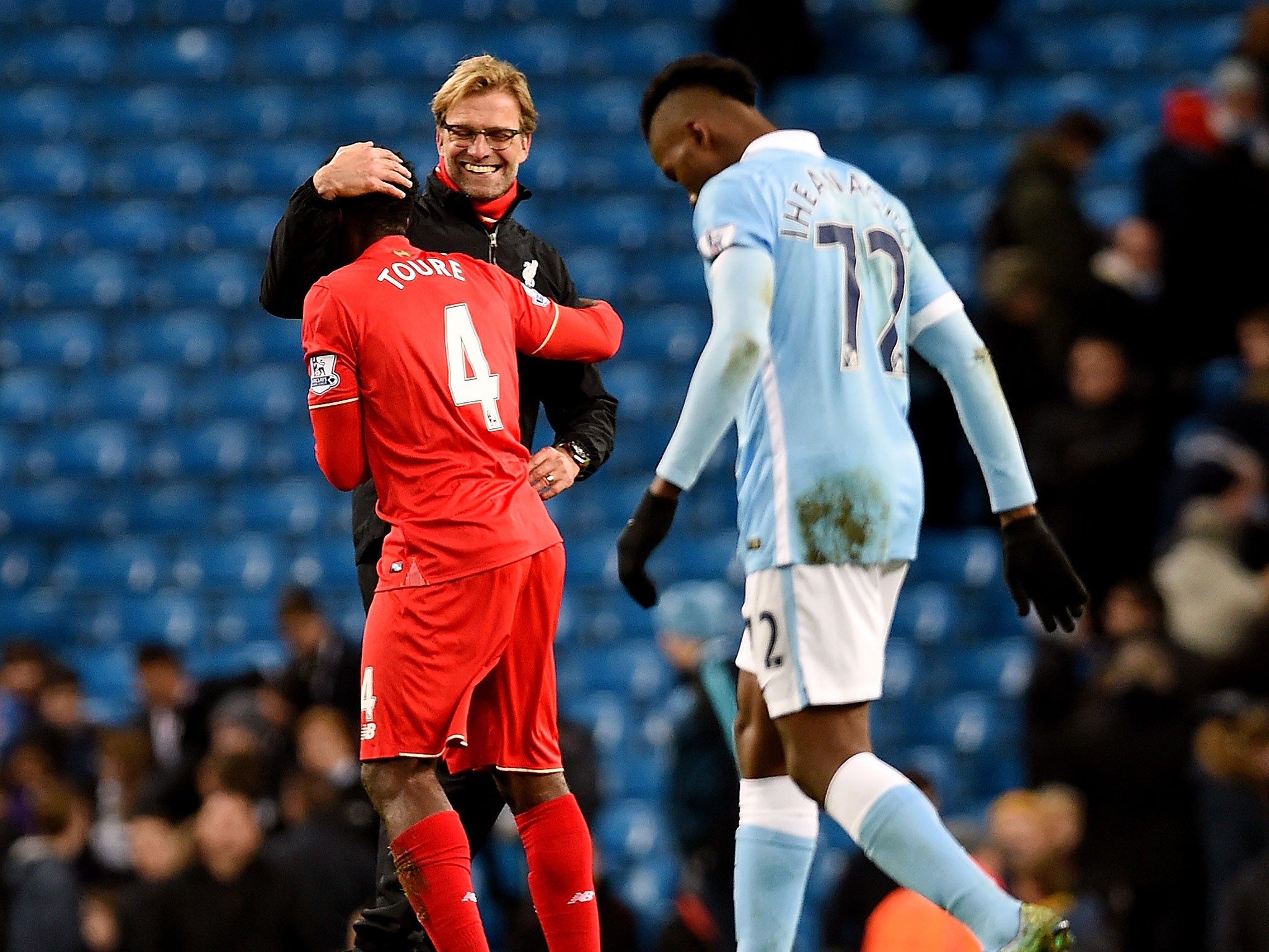 Kolo Toure was next in line to receive a hug from Klopp...