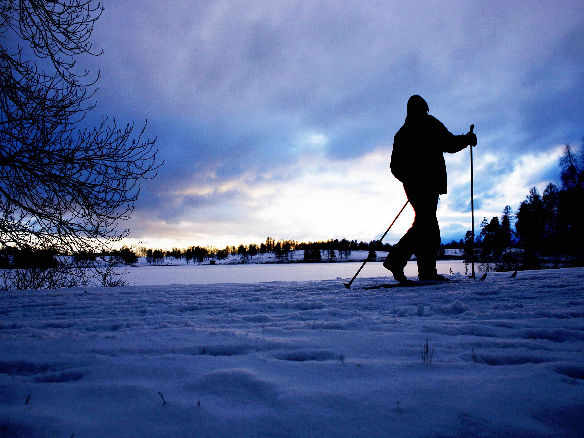 A man navigates the snow in Oslo, Norway