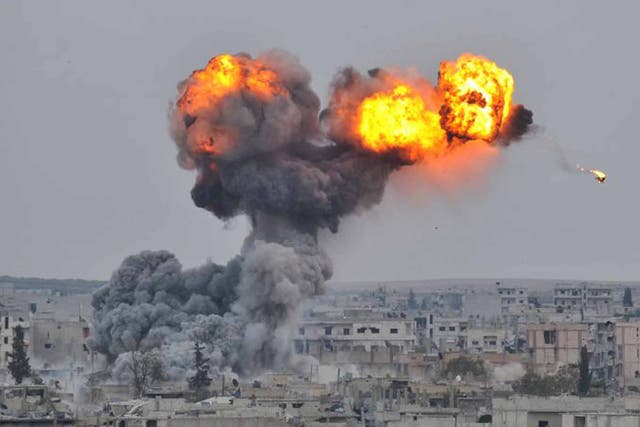A US air strike on the Isis-held town of Kobani in 2014