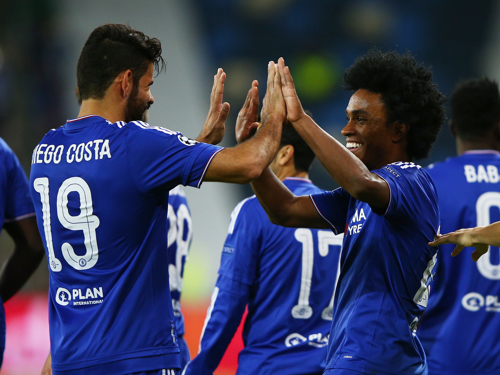 Chelsea's Willian celebrates his strike with Diego Costa