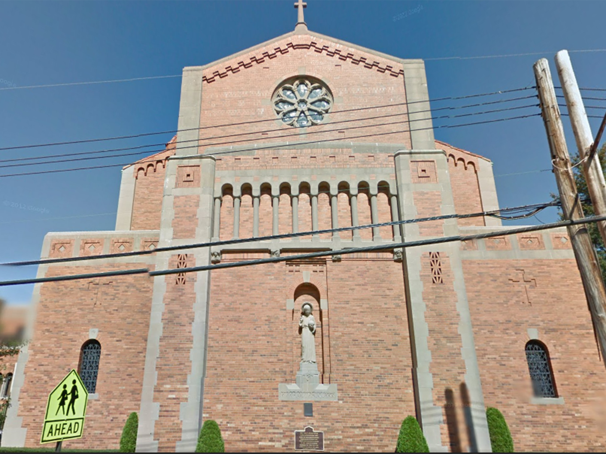 The full-term baby was found lying in the manger at the Holy Jesus Child Church, in the Richmond Hill neighbourhood of Queens.