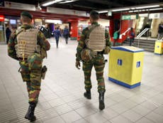 Brussels schools and Metro reopen with security presence high