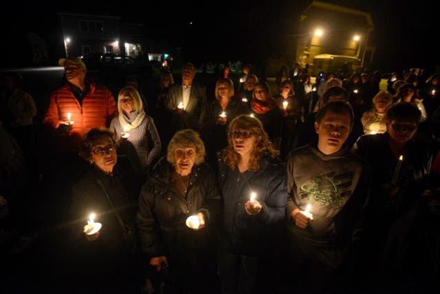 Community members held a vigil after the October killing