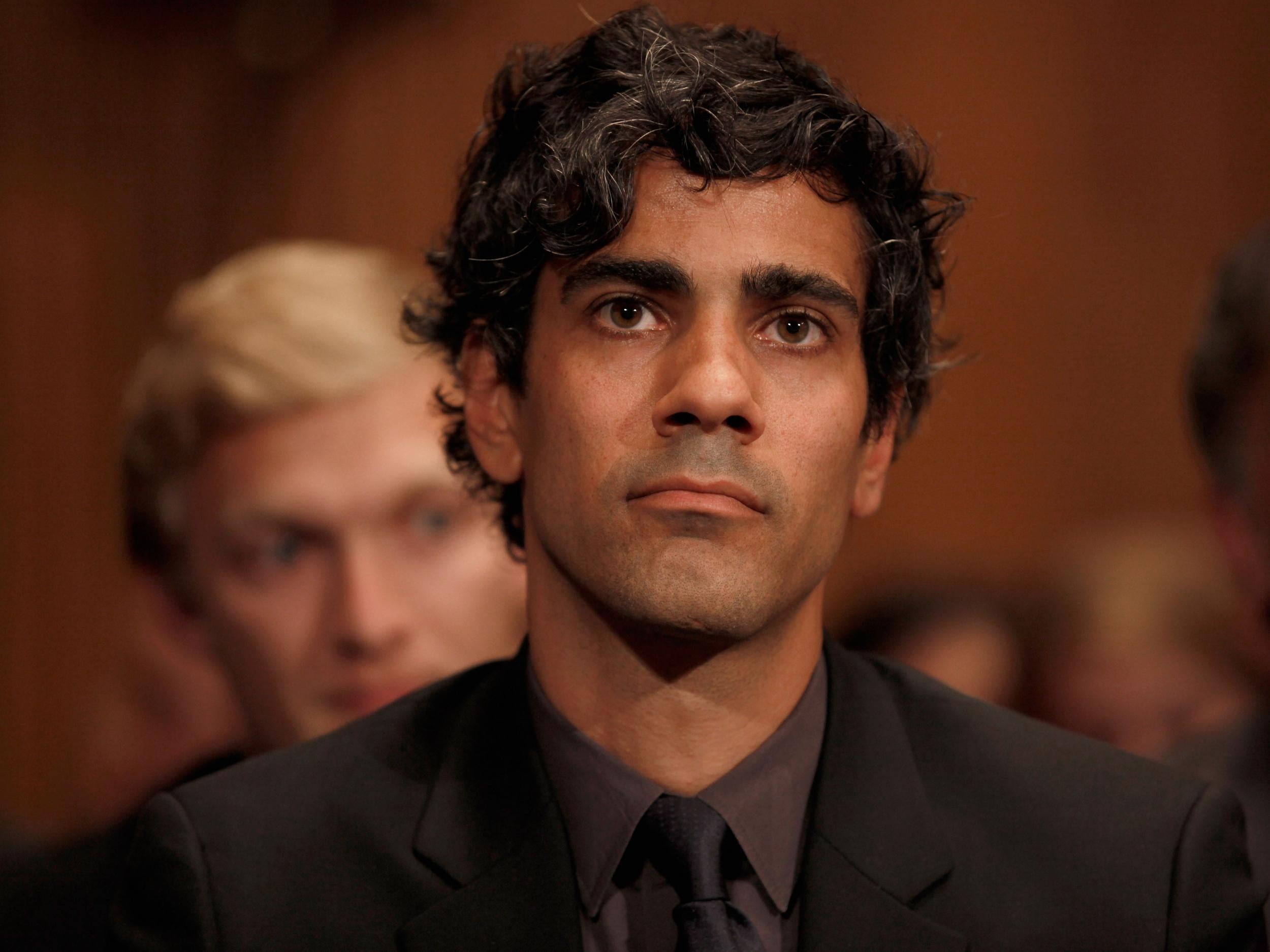 Yelp CEO Jeremy Stoppelman listens to Google Executive Chairman Eric Schmidt during a US Senate Judiciary hearing on alleged anti-competitive practices by Google in 2011
