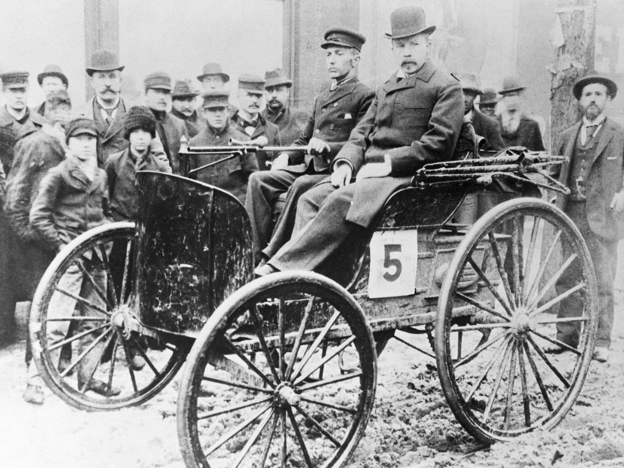 J. Frank Duryea pictured in the car he co-created in Illinois, 1895