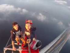Two daredevils climb 1,150ft crane to take selfie above Istanbul bridge