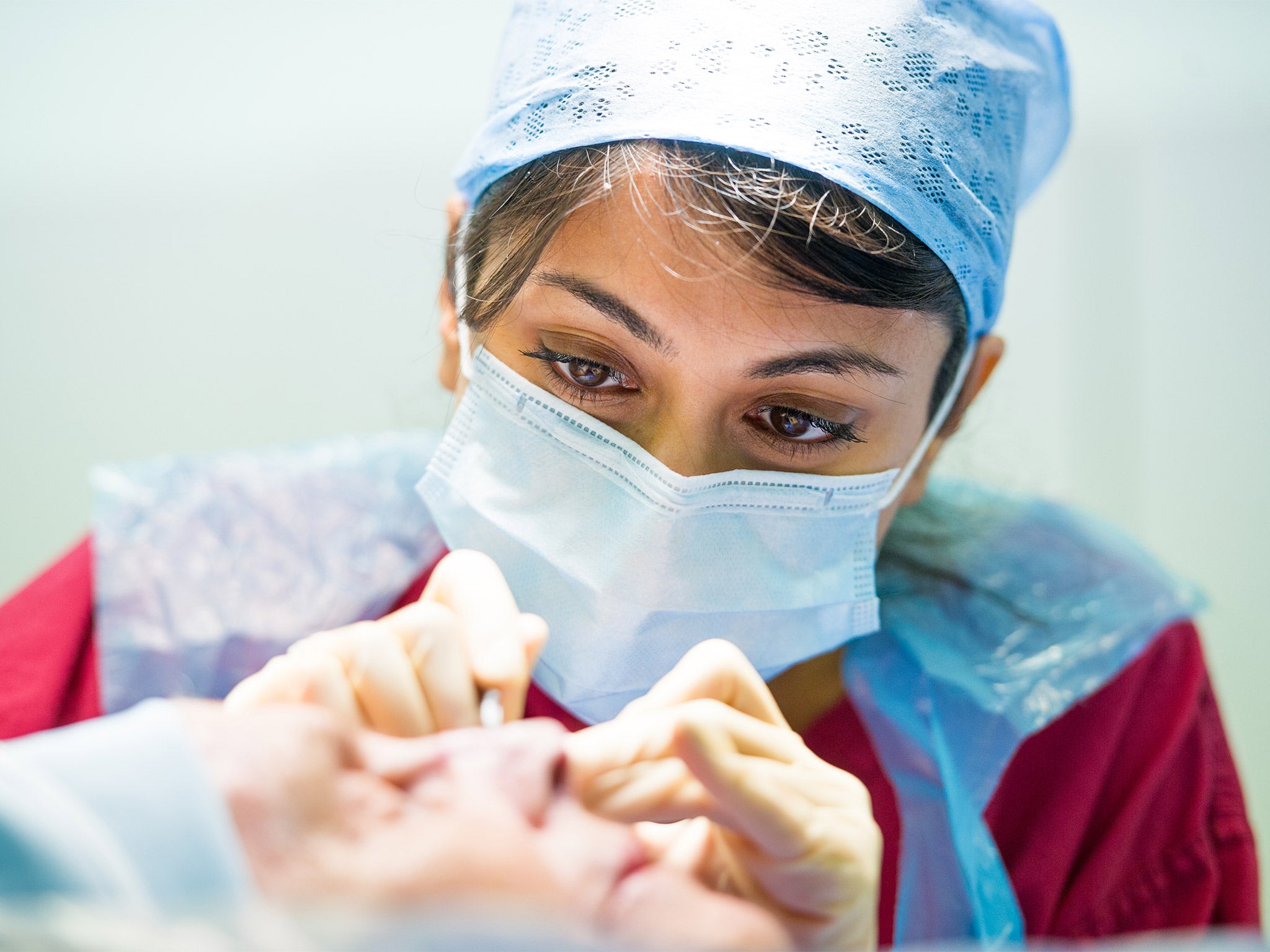 A patient receives treatment at St John's Dermatology Unit