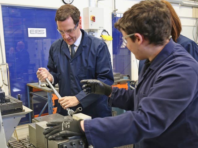 George Osborne receives guidance from an apprentice during a visit to an engineering company earlier this year