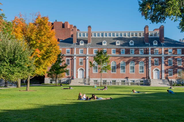 Students relax on the lawns around Harvard University in the US 