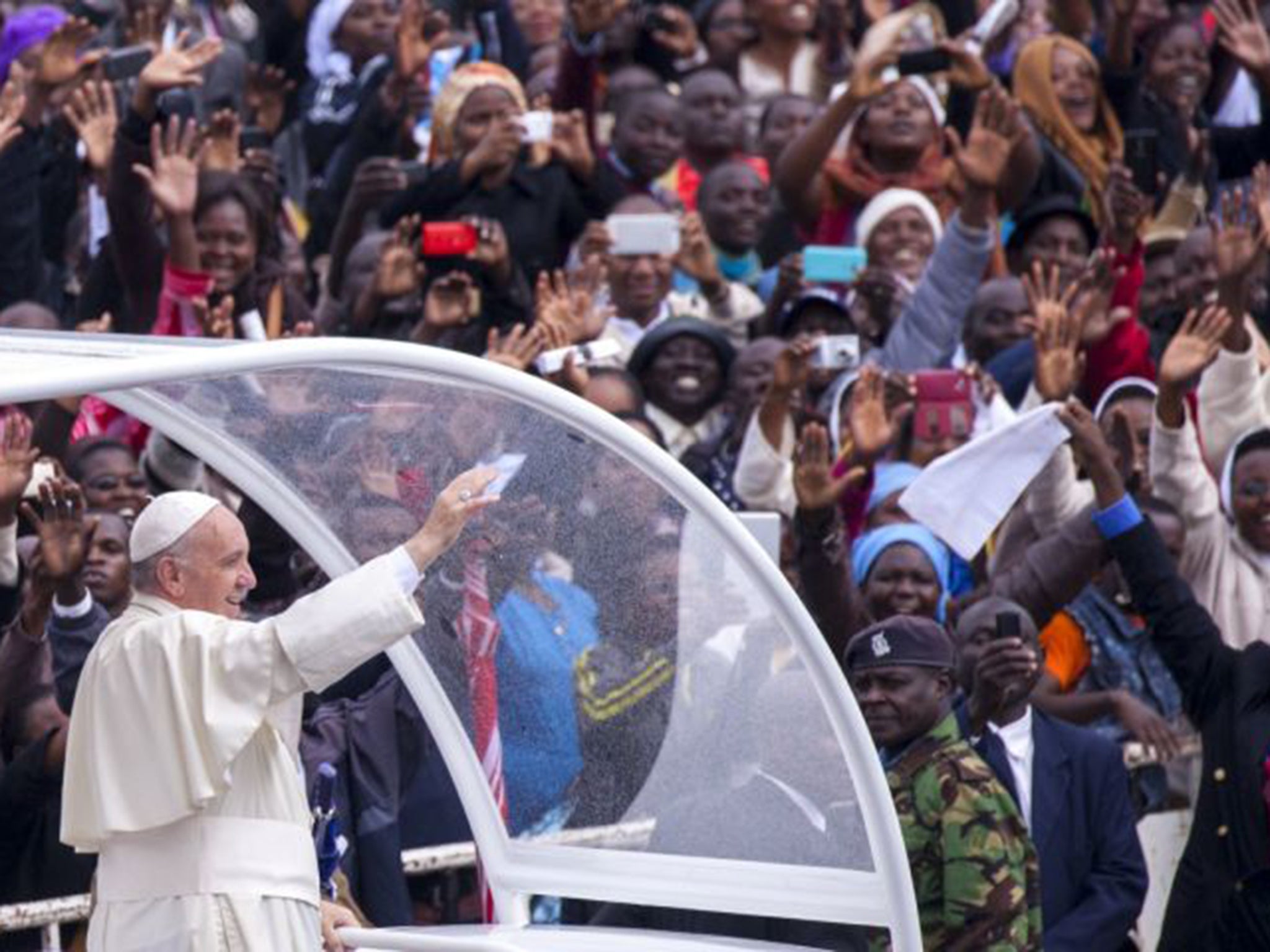 Pope Francis arrives at the University of Nairobi to deliver an open-air mass