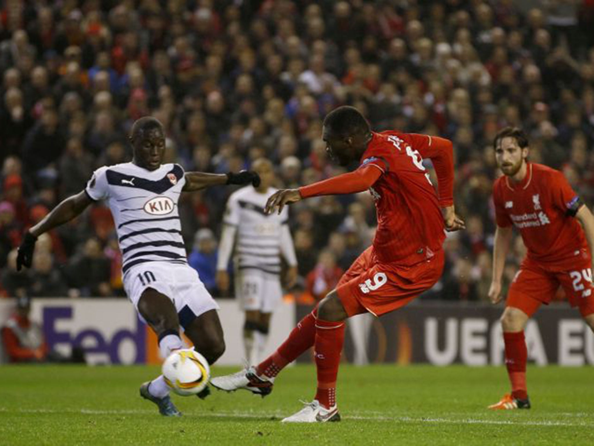 Christian Benteke turns and drives in the winner for Liverpool