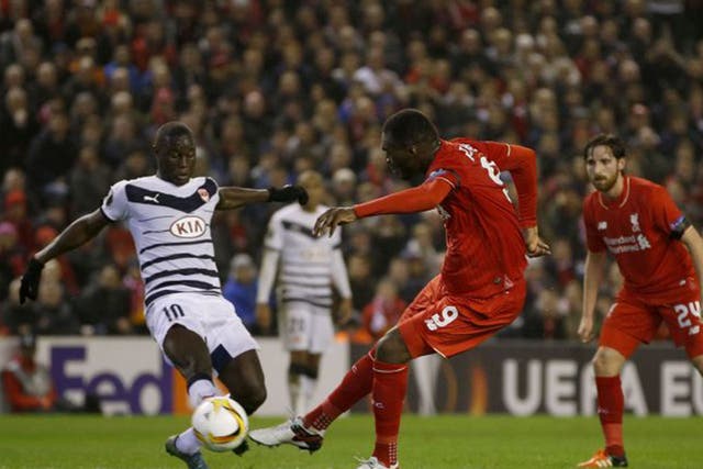 Christian Benteke turns and drives in the winner for Liverpool