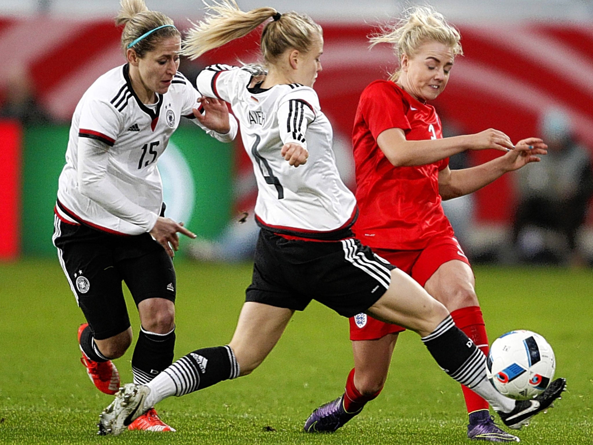 England’s Alex Greenwood (right) is challenged by Leonie Maier of Germany during yesterday’s friendly