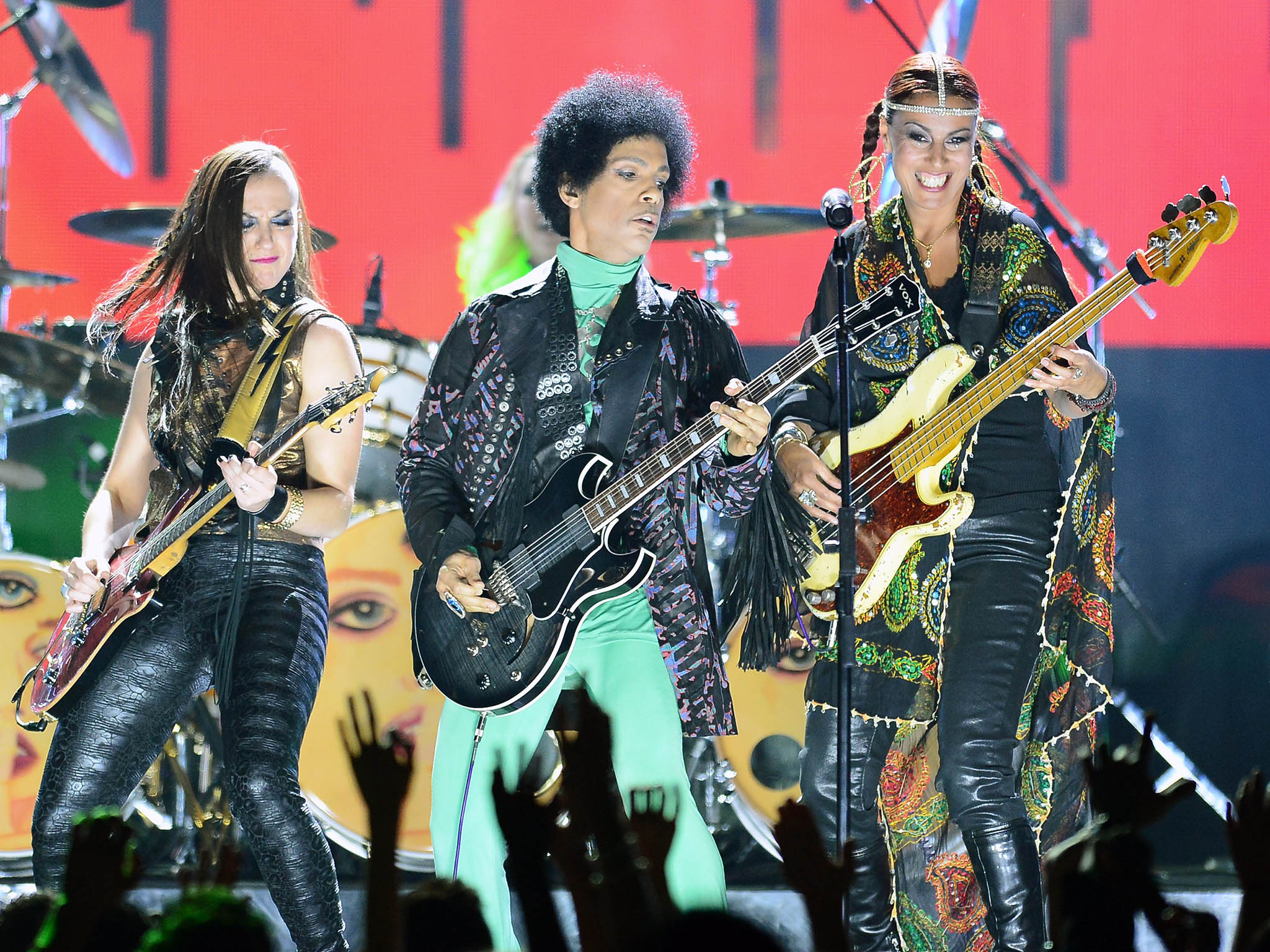 Prince performing on stage in Las Vegas in 2013