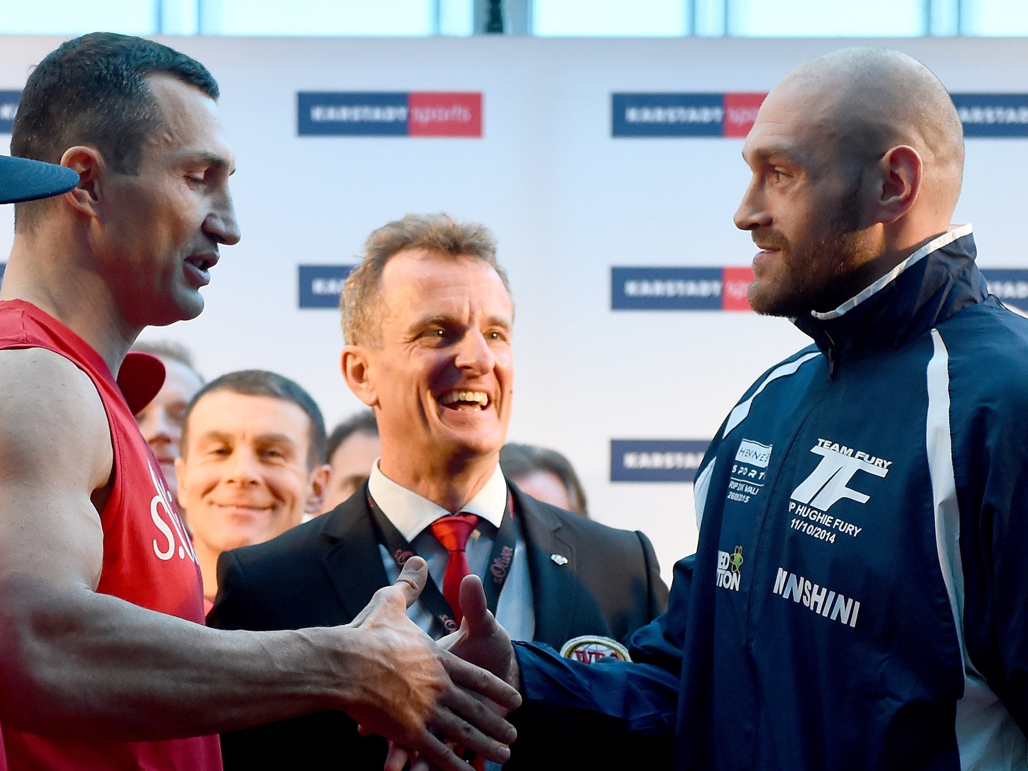 Wladimir Klitschko and Tyson Fury shake hands after today's weigh in, but Fury rejected his hand before the weigh in