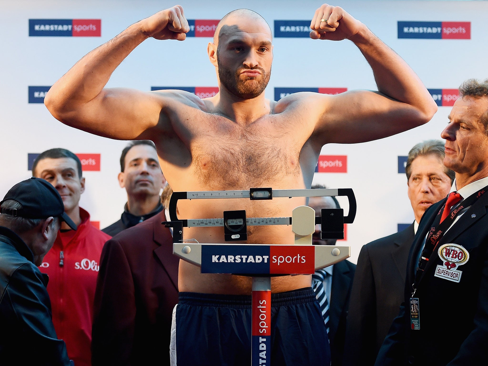 A streamlined Tyson Fury on the scales at the weigh in on Friday