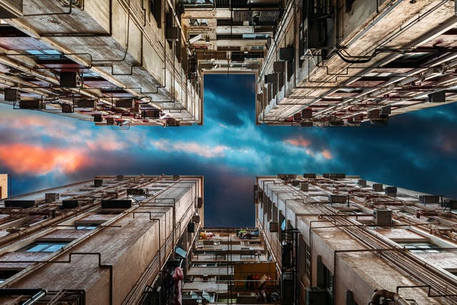 ‘The Exoskeleton’: Stewart developed a style of shooting from the ground looking up, with towers crowding the edges of his images, creating a surreal tunnel effect that ends in odd geometric shapes