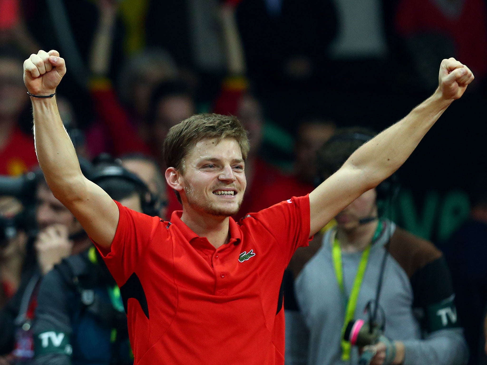 David Goffin celebrates victory over Kyle Edmund in the Davis Cup final