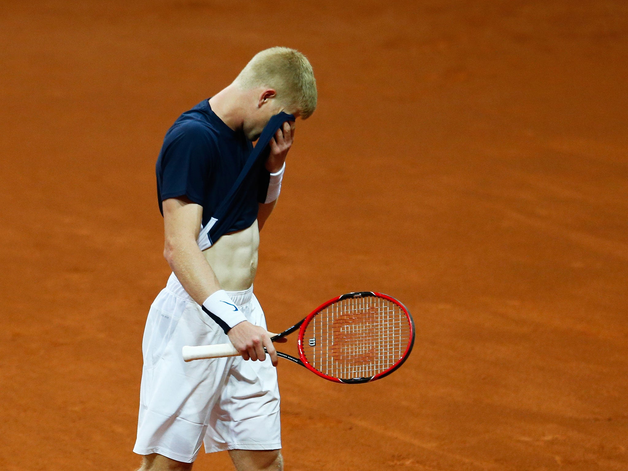 Kyle Edmund reacts after suffering a five-set loss to David Goffin in the Davis Cup final