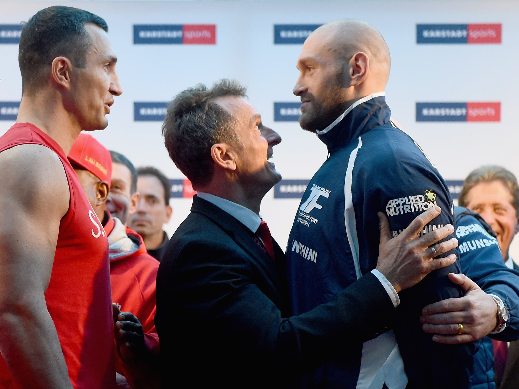 Wladimir Klitschko and Tyson Fury clash at the weigh in