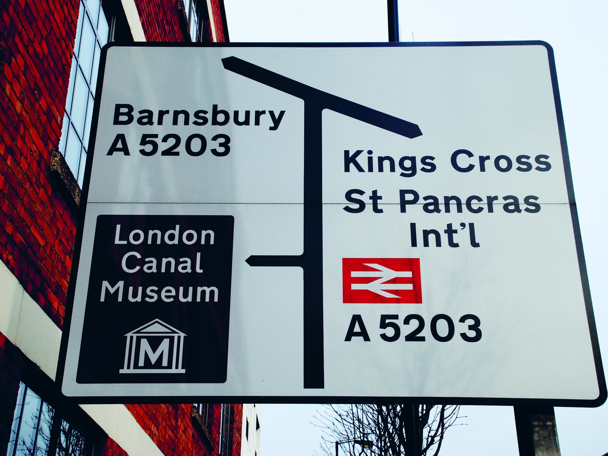 Central London road sign, with the train symbol