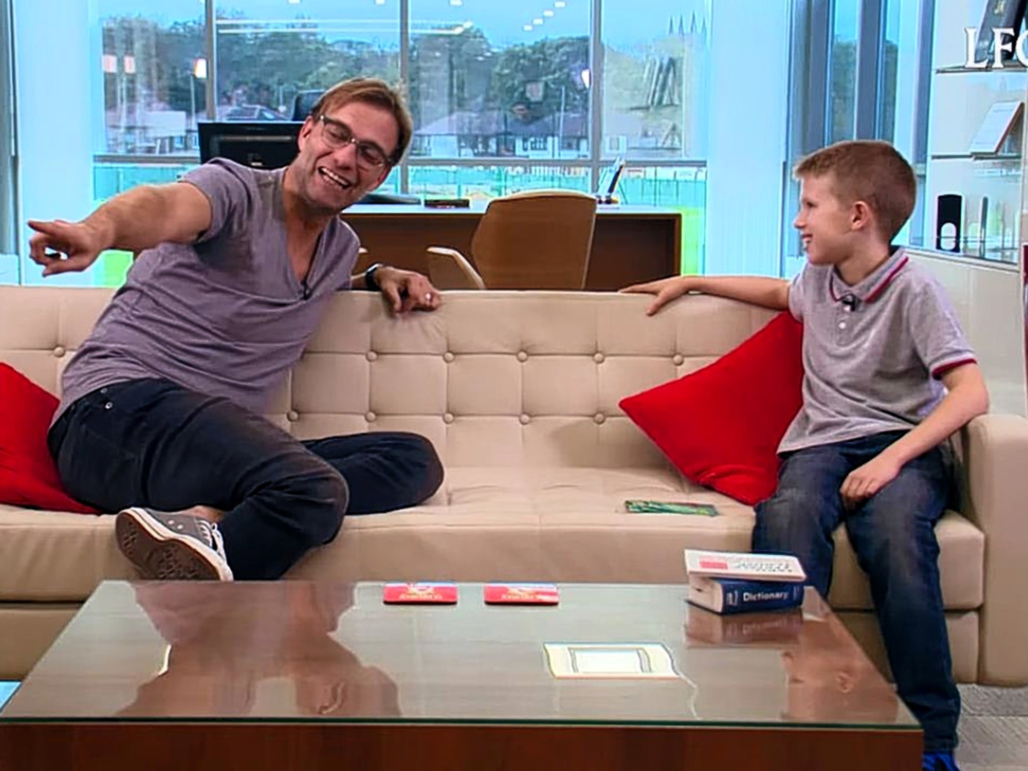 Jürgen Klopp on the sofa with his nine-year-old interviewer and Scouse tutor Isaac
